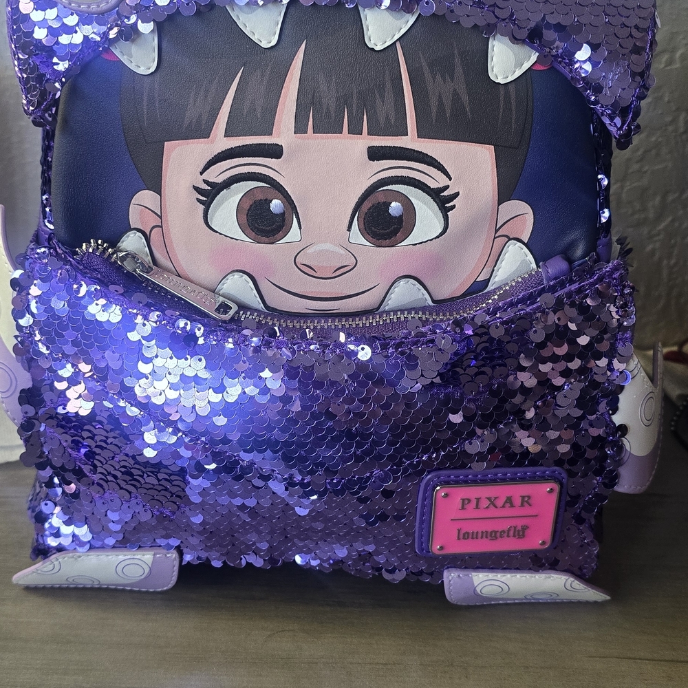 Loungefly Sequin Purple Pixar Monsters Inc Mini Backpack...Boo